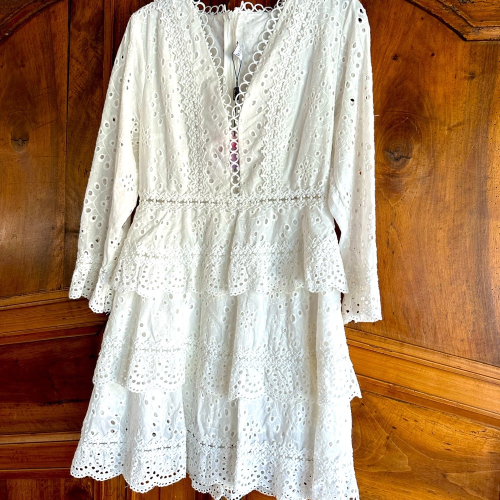 White dress. White, ruffle and feminine.